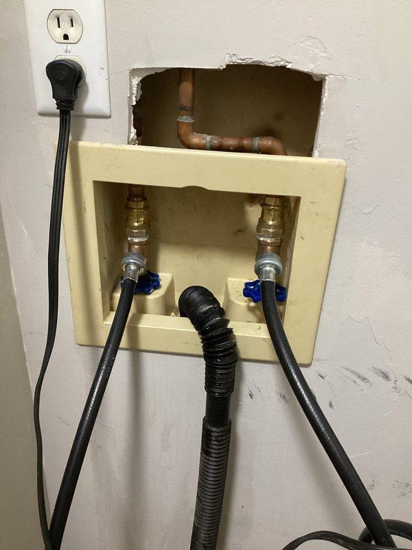 Responded to service call for washing machine installation issue. Upon arrival, found existing washing machine shut-off valves were corroded and inoperable due to age, preventing proper closure and safe appliance connection. Successfully replaced both hot and cold water supply valves with new quarter-turn shut-off valves featuring cross-handle controls. Installed new braided stainless steel flexible supply lines to ensure secure connections. Tested all connections for proper operation and verified no leaks present. System now fully functional and ready for washing machine hookup.