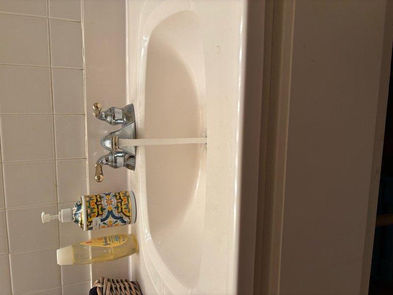 Completed comprehensive plumbing inspection with focus on exterior faucet and upstairs hallway toilet. Inspected outdoor spigot for potential freeze damage and confirmed proper operation with no leaks or structural compromise. Replaced malfunctioning toilet trip lever with stock replacement part, restoring full functionality. Performed complete residential plumbing system inspection including all fixtures, supply lines, and drainage components. All systems tested and left in proper working order with no additional concerns identified.