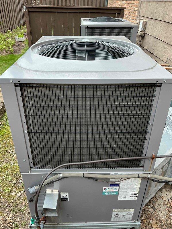 Completed annual air conditioning tune-up and system inspection on residential HVAC unit. Accessed interior components including control board, capacitor, and motor assembly to verify proper operation. Inspected outdoor condenser units, fan assemblies, and coil condition. System tested and confirmed operational with all components functioning within normal parameters.