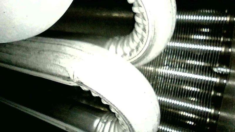 Responded to no heat call on 10-year-old Goodman furnace affecting entire residence. Upon inspection, identified dirty flame sensor preventing ignition cycle from completing. Cleaned flame sensor rod to restore proper flame rectification signal. Performed complete system tune-up including filter inspection, blower compartment cleaning, and verification of proper airflow through heat exchanger and evaporator coil. Tested all safety controls and confirmed furnace returned to normal heating operation with proper burner ignition and flame sensing.