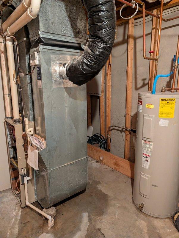 Responded to service call for furnace leaking water on 6-year-old unit. Upon inspection, identified failed condensate collector box as source of water leak. Removed defective collector box and installed replacement unit. Verified proper drainage through condensate system, confirmed no additional leaks, and tested furnace operation to ensure proper functionality.