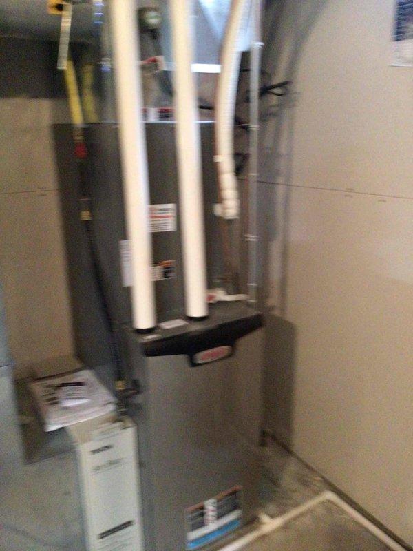 Completed comprehensive cooling system tune-up on residential Lennox AC unit as part of recurring maintenance agreement. Performed outdoor condenser cleaning, verified all electrical components operating within manufacturer specifications, replaced humidifier pad with customer-supplied part, and reset filter change indicator. System tested and confirmed operating properly with no concerns identified.