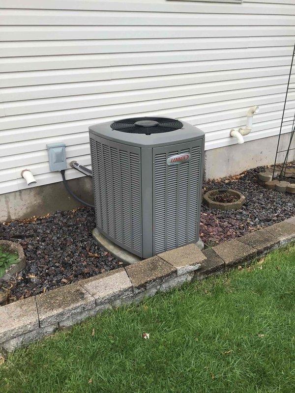 Completed comprehensive cooling system tune-up on residential Lennox AC unit as part of recurring maintenance agreement. Performed outdoor condenser cleaning, verified all electrical components operating within manufacturer specifications, replaced humidifier pad with customer-supplied part, and reset filter change indicator. System tested and confirmed operating properly with no concerns identified.