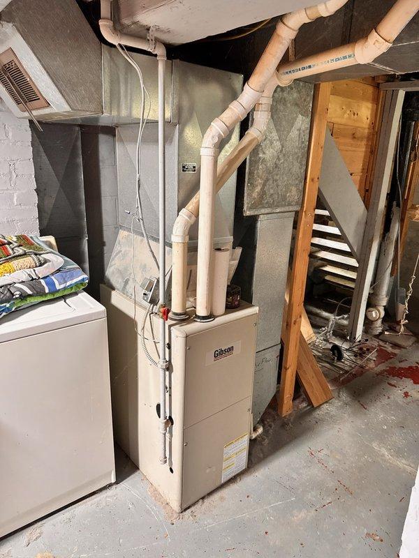 Responded to no heat call on Gibson natural gas furnace. Upon arrival, homeowner reported unit would run for only a couple minutes before shutting down and required toggling power switch to restart after extended idle periods. Initiated system startup and observed igniter failing to achieve proper glow intensity during ignition sequence. Electrical testing confirmed igniter was weak and operating below specifications. Visual inspection revealed component in deteriorated condition. Performed comprehensive system evaluation and found air filter completely plugged, restricting airflow. All other furnace components including blower motor, flame sensor, gas valve, and limit switches tested within normal operating parameters. Replaced failed hot surface igniter with new OEM component. Cycled system through multiple heating cycles to verify proper ignition sequence, flame establishment, and continuous operation. Unit now heating normally with all safeties functioning correctly.