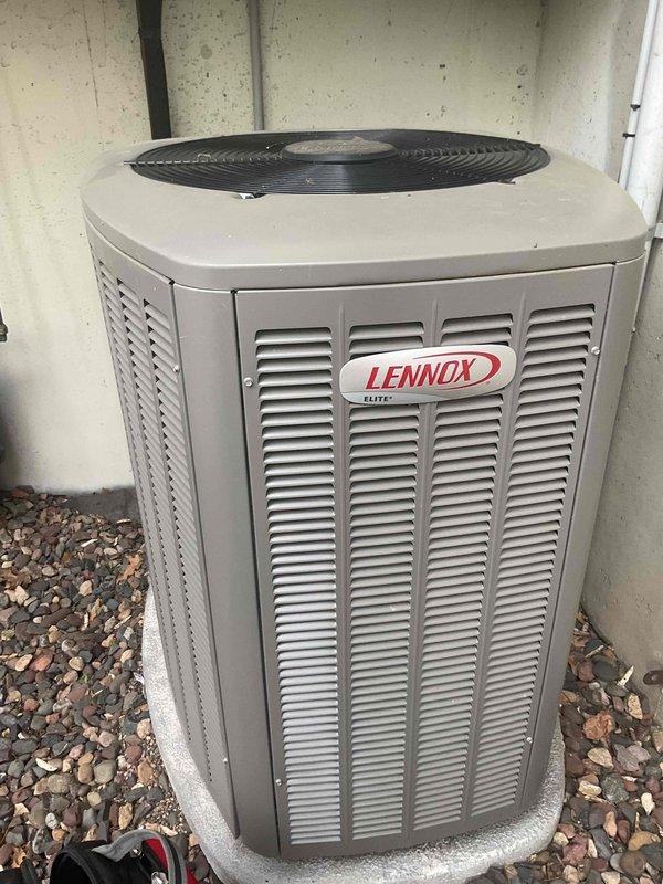 Performed scheduled maintenance agreement tune-up on Lennox Elite air conditioning system. Inspected both outdoor condensing unit and indoor air handler, finding a heavily soiled air filter restricting airflow. Replaced dirty filter with new unit to restore proper system airflow and efficiency, completing all preventive maintenance checklist items per agreement terms.