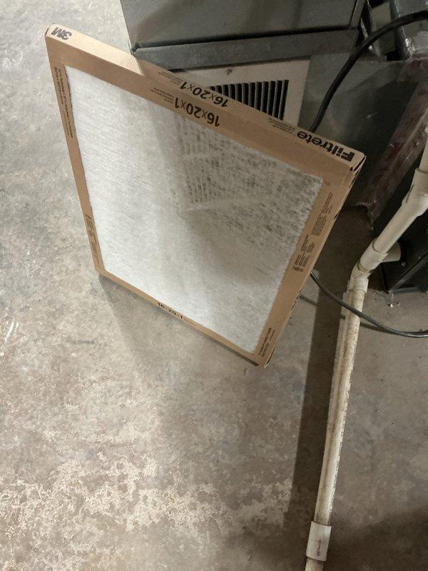 Performed maintenance on a 21-year-old R22 air conditioning system. Identified dual capacitor failure, contactor with significant pitting, and A-coil heavily contaminated with dust and debris accumulation. Replaced dirty air filter and documented internal coil condition using inspection camera. Advised customer of failing components including dual capacitor and contactor requiring replacement, as well as the need for thorough A-coil cleaning to restore proper airflow and system efficiency.