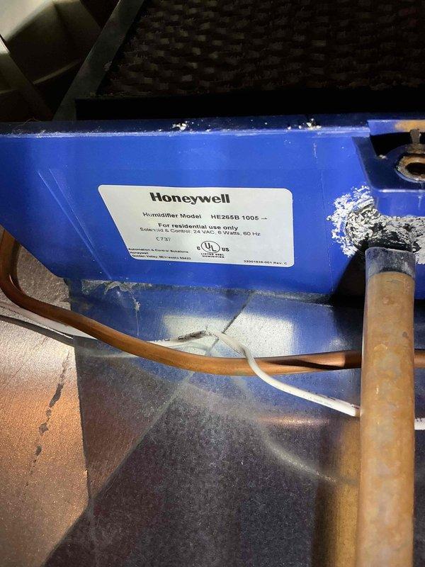 Completed annual spring cooling maintenance visit including inspection and tune-up of one air conditioning system and one dehumidifier unit. During inspection, identified a leaking Honeywell HE360B-1008 humidifier requiring repair. Provided estimate for replacement humidifier components to resolve the leak issue.