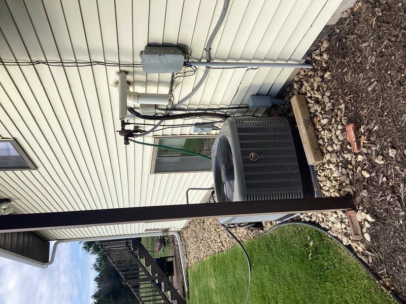 Performed comprehensive AC tune-up on 33-year-old system including full inspection of indoor and outdoor components. Replaced air filter, verified blower assembly was clean and operating within specifications, confirmed evaporator coil cleanliness and proper condensate drainage, inspected routine outdoor unit components, and cleaned condenser coil. System tested and monitored for 15 minutes with 18-20 degree temperature drop across coil; all components functioning properly despite 40-degree ambient outdoor temperature at time of service.