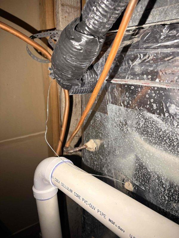 Completed comprehensive AC tune-up on system with previous performance issues, though no problems reported in the past year. Cleaned air filters and condenser coils which showed dirt accumulation, inspected evaporator coil finding it in good condition, verified supply and return temperatures within acceptable range, and confirmed all electrical connections and outlets were secure and functioning properly.