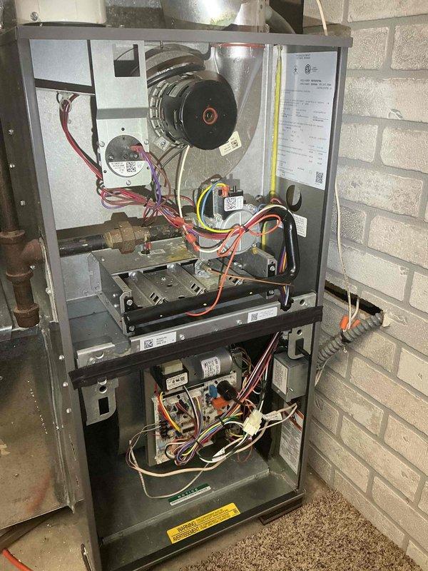 Responded to no heat call on residential furnace less than 10 years old. Unit displayed error codes 10 and 13 upon arrival. Performed diagnostic evaluation of heating system and identified failed flame sensor as root cause of operational failure. Removed defective sensor from burner assembly and installed new replacement sensor. Verified proper sensor positioning and secure mounting. Restored power to unit and cycled system through complete heating operation. Confirmed successful ignition sequence, proper flame detection, and steady burner operation without error codes. Tested system for multiple heating cycles to ensure reliable performance. Unit now operating within manufacturer specifications and providing adequate heat to occupied space.