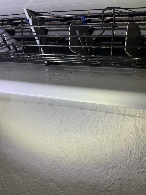 Completed routine cooling maintenance on two systems: a 7-year-old ground-level AC unit and a 3-year-old mini split system. Performed comprehensive tune-up including inspection of evaporator coils, condensate drain pan, and blower wheel cleaning on primary unit. Noted mini split head unit is missing pre-filters that were never removed by homeowner. Verified system temperatures and operational performance; both units operating within normal parameters with no issues detected.