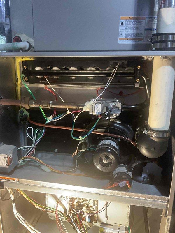 Responded to no-heat call on 10+ year old furnace displaying error code 33. Upon inspection, discovered cracked heat exchanger which poses safety hazard due to potential carbon monoxide leakage. System was immediately red-tagged and unit taken out of service to protect occupants.
