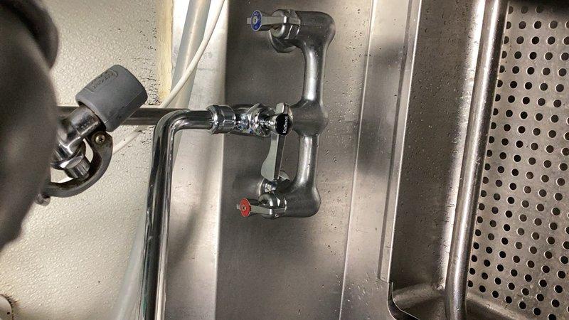 Diagnosed and replaced faulty diverter handle in commercial faucet assembly to restore proper water control operation. Installed new parts and verified hot and cold water shut-off valves functioning correctly. Completed installation ensures improved water flow efficiency and long-term operational reliability for the commercial sink station.