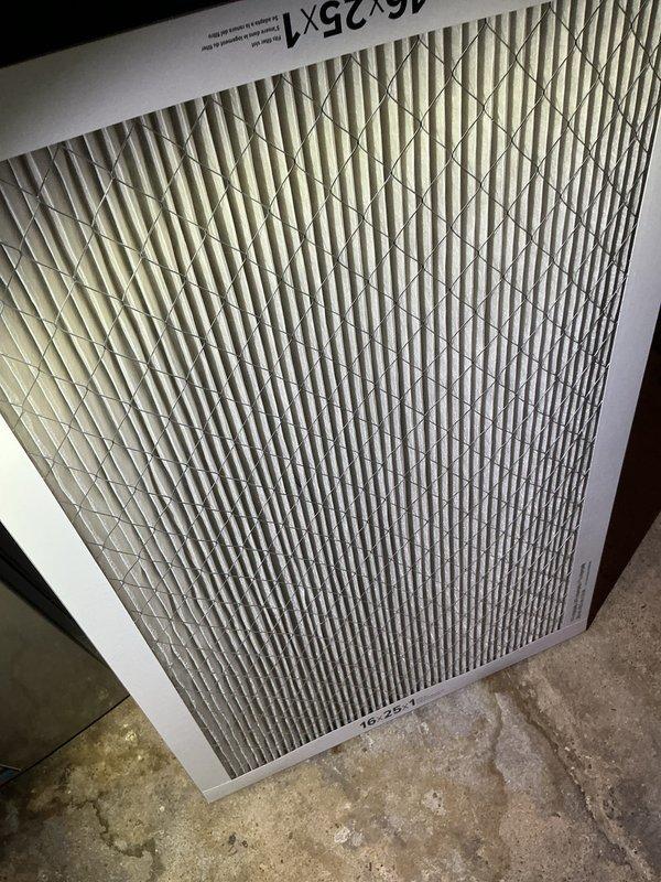 Performed annual cooling maintenance on 1-year-old Lennox air conditioning system per Family Rewards recurring service agreement. Conducted comprehensive AC tune-up including system inspection and performance evaluation. Found condenser coil had accumulated dust and debris buildup. Thoroughly cleaned condenser coil to restore proper airflow and heat transfer efficiency. Verified 16x25x1 air filter condition. System operational with no additional issues identified upon completion.