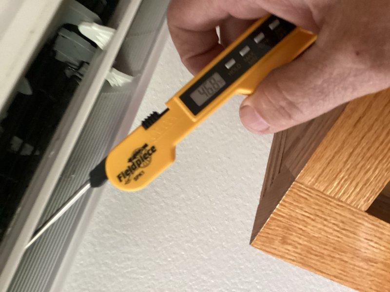 Performed comprehensive tune-up on mini-split system including cleaning of condenser coil, condensate drain maintenance, and operational verification. System tested and confirmed achieving 23° temperature drop across evaporator coil, indicating proper refrigerant charge and heat exchange efficiency. Provided estimate for blower wheel cleaning service, which has been performed annually on this unit.