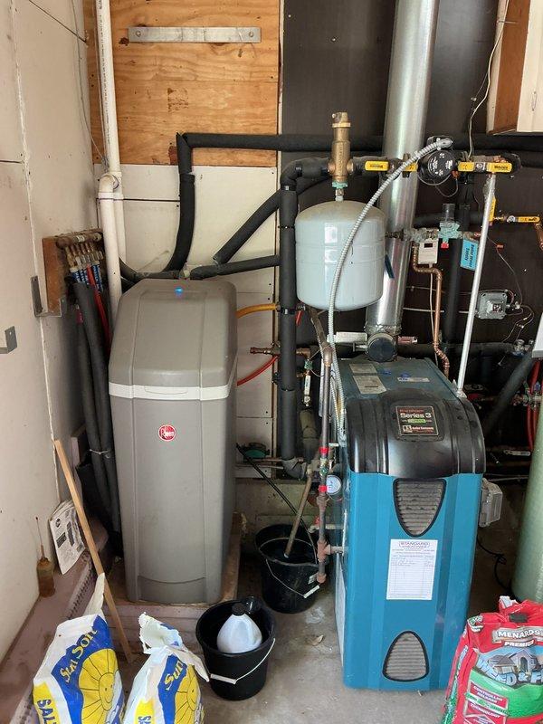 Completed routine plumbing inspection with no issues identified. Inspected water softener system, pressure tank, plumbing connections, and associated piping throughout the mechanical spaces. Explained system operation and maintenance requirements to homeowner.