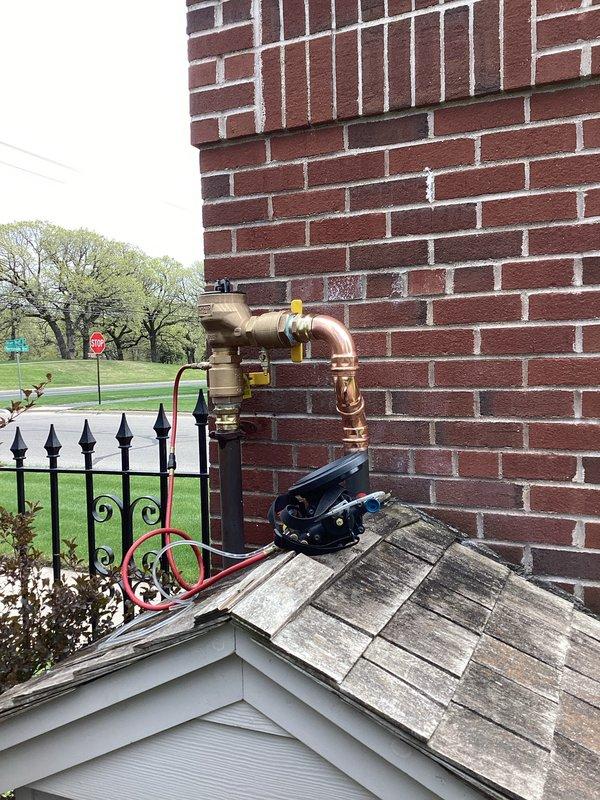 Removed and disposed of the existing irrigation pressure vacuum breaker mounted on the exterior brick wall. Procured additional fittings required for proper installation and supplied and installed a new irrigation pressure vacuum breaker with copper piping connections. Completed RPZ testing and obtained necessary permit to ensure compliance with backflow prevention regulations.