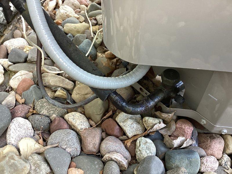 Completed annual AC tune-up and maintenance on Bryant air conditioning system. Performed comprehensive inspection including temperature split verification, filter examination, electrical connection testing, and adjusted humidifier settings to summer mode. System operating within normal parameters with no issues identified during service visit.