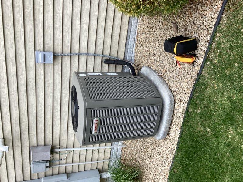 Completed comprehensive air conditioning tune-up on a 2-year-old system found in good working condition. Performed standard maintenance procedures including inspection of outdoor condenser unit, electrical connections at interior panel, and refrigerant lines, with all components operating within normal parameters and no issues identified.