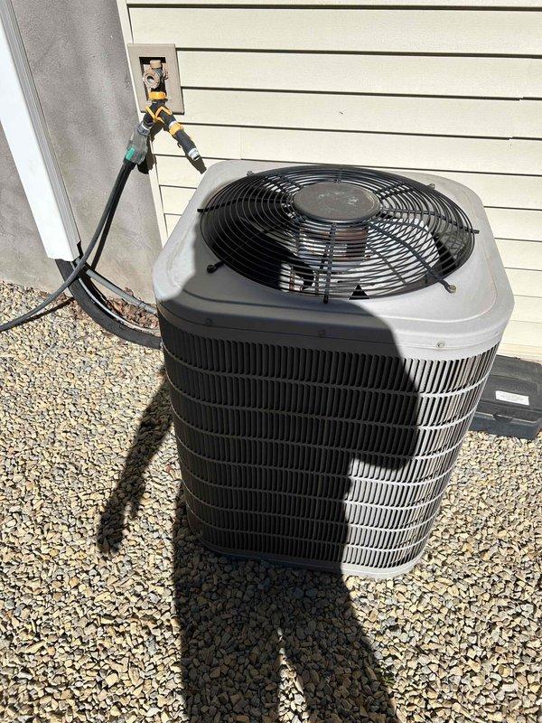 Completed comprehensive air conditioning tune-up and maintenance service on residential HVAC system. Inspected all system components, verified proper operation of furnace and AC unit, cleaned outdoor condenser coil with water, and confirmed optimal 15-degree temperature split across the evaporator. All equipment functioning within normal parameters with no issues identified.