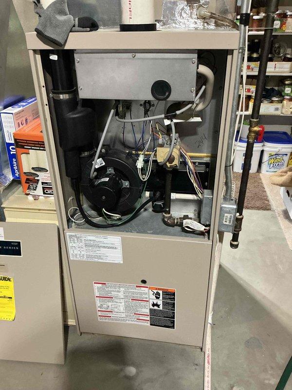 Completed annual cooling tune-up on 26-year-old Lennox air conditioning system. Performed comprehensive inspection including contactor, capacitor, refrigerant charge, compressor operation, condenser coil, air filter, control board, heat exchanger, evaporator coil, and temperature split across system. All components found to be operating within acceptable parameters. Noted moderate rust present around factory welds on backside of primary heat exchanger. Due to advanced age of equipment and observed heat exchanger condition, recommended proactive replacement of both furnace and air conditioning system to prevent future failure. Scheduled service advisor consultation for replacement equipment proposal.