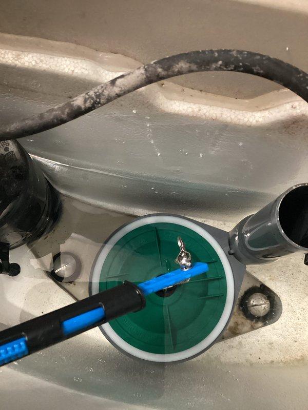 Responded to callback for spare bathroom toilet where flush handle had become disconnected. Upon inspection, found the flapper chain had come unhooked from the flush lever arm. Reconnected chain to handle assembly and tightened the clasp to ensure secure attachment and proper operation.