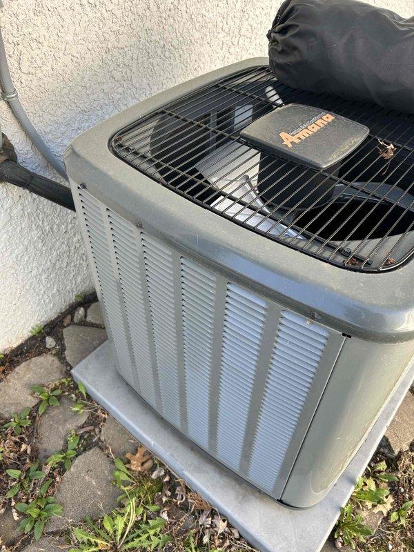 Completed comprehensive preventive maintenance on residential heating and cooling system. Performed full inspection of both furnace and air conditioning unit, verifying all electrical components including capacitor values, contactor condition, blower motor, and condenser fan operation. Measured and confirmed proper temperature split in cooling mode and verified heating cycle response. Checked and cleared condensate drain line, inspected air filters, and tested all safety controls and system safeties for proper function. Used clamp meter to verify amperage draws on compressor and fan motors were within manufacturer specifications. No refrigerant leaks detected, no combustion-related issues observed, and no active fault codes present. Cleaned accessible components on outdoor condensing unit and indoor air handler. System operating normally in both heating and cooling modes with all parameters within acceptable ranges.