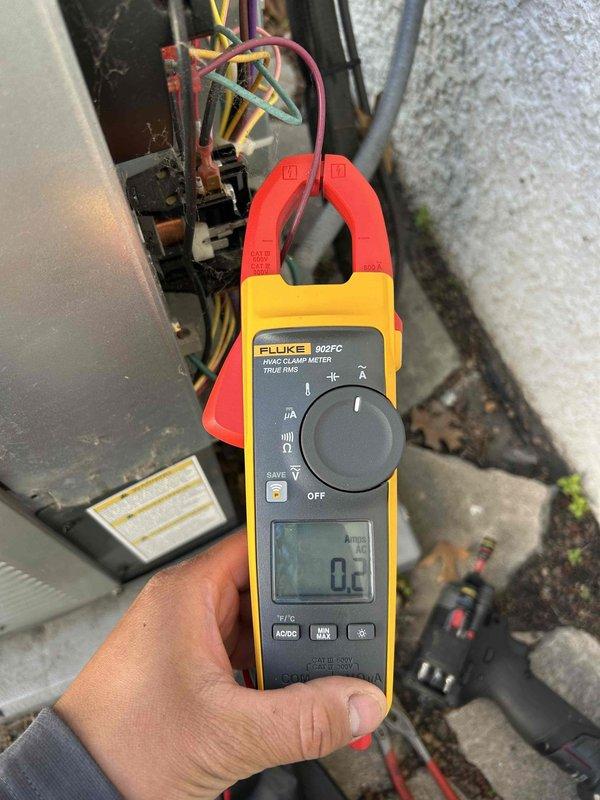 Completed comprehensive preventive maintenance on residential heating and cooling system. Performed full inspection of both furnace and air conditioning unit, verifying all electrical components including capacitor values, contactor condition, blower motor, and condenser fan operation. Measured and confirmed proper temperature split in cooling mode and verified heating cycle response. Checked and cleared condensate drain line, inspected air filters, and tested all safety controls and system safeties for proper function. Used clamp meter to verify amperage draws on compressor and fan motors were within manufacturer specifications. No refrigerant leaks detected, no combustion-related issues observed, and no active fault codes present. Cleaned accessible components on outdoor condensing unit and indoor air handler. System operating normally in both heating and cooling modes with all parameters within acceptable ranges.
