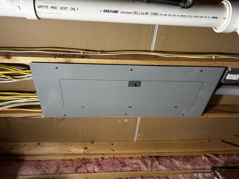 Responded to request for increased fan circulation airflow in fan-only mode on recently installed HVAC system. Inspected thermostat DIP switch settings and confirmed unit already configured for maximum airflow capacity with current basic thermostat. Explained that additional fan speed adjustment options would require upgrading to an S40 thermostat and provided pricing for that upgrade. Documented existing installation including furnace/air handler unit with flexible ductwork, PVC condensate/exhaust lines, gas line connections with brass fittings and valves, and electrical panel connections. Customer also inquired about water heater and electrical work; scheduled separate appointment to address those additional requests.