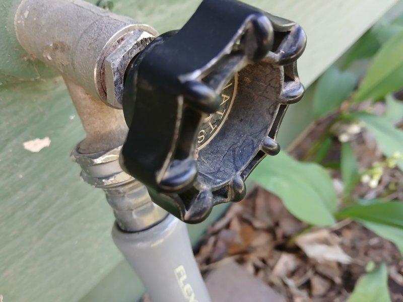 Responded to outdoor hose bib that would not shut off and was leaking through the stem. Upon arrival, found spigot temporarily controlled with attached hose. Diagnosed failed stem packing and internal valve components on weathered exterior fixture. Presented customer with repair versus replacement options, explaining benefits and costs of each approach to resolve the leak issue.