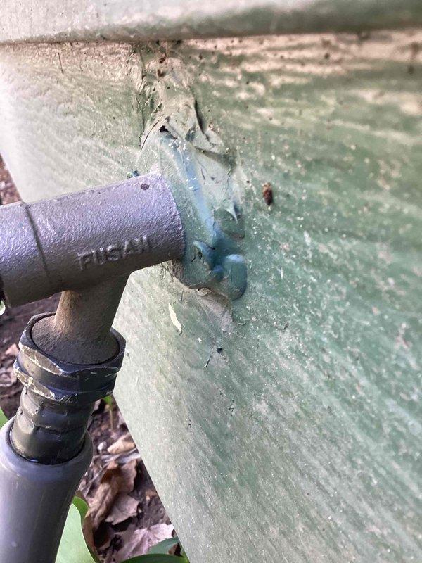 Responded to outdoor hose bib that would not shut off and was leaking through the stem. Upon arrival, found spigot temporarily controlled with attached hose. Diagnosed failed stem packing and internal valve components on weathered exterior fixture. Presented customer with repair versus replacement options, explaining benefits and costs of each approach to resolve the leak issue.