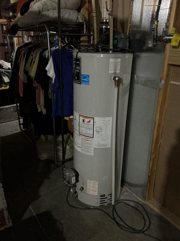 Completed comprehensive 12-4 AC tune-up on 8-year-old FRP system. Replaced air filter, thoroughly cleaned outdoor condensing unit, and tested all system components including electrical connections, refrigerant pressures, and operational controls. Documented equipment make, model, and serial number information with photographs of both the furnace unit and water heater for maintenance records. All systems tested and operating within normal parameters upon completion.