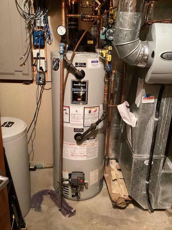 Completed comprehensive plumbing inspection of residential mechanical systems including water heater, water softener, and associated copper piping and connections. All plumbing components, pressure systems, and safety devices were visually examined and documented, with no immediate concerns identified during the inspection.