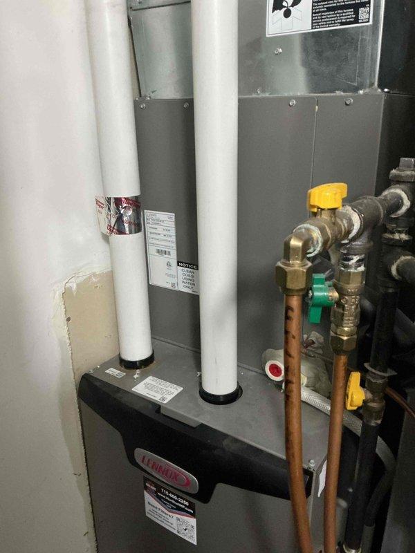 Performed comprehensive maintenance inspection on 2-year-old Lennox air conditioning system with no reported issues. Evaluated all major components including contactor, capacitor, compressor, control board, blower motor and wheel assembly—all found to be in good operating condition. Verified refrigerant charge at proper levels and confirmed system operating within normal parameters. Noted evaporator coil beginning to accumulate debris but unable to perform cleaning due to lack of accessible water source at location. Air filter showing moderate dirt accumulation. All electrical connections tested and confirmed secure. System currently functioning properly with no repairs or recommendations required at this time.