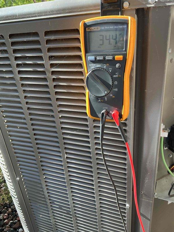 Performed comprehensive maintenance inspection on 2-year-old Lennox air conditioning system with no reported issues. Evaluated all major components including contactor, capacitor, compressor, control board, blower motor and wheel assembly—all found to be in good operating condition. Verified refrigerant charge at proper levels and confirmed system operating within normal parameters. Noted evaporator coil beginning to accumulate debris but unable to perform cleaning due to lack of accessible water source at location. Air filter showing moderate dirt accumulation. All electrical connections tested and confirmed secure. System currently functioning properly with no repairs or recommendations required at this time.