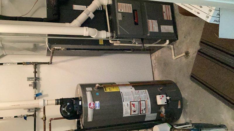 Performed comprehensive AC tune-up on 10-year-old system. Inspected air filter and blower assembly, both found clean and operating properly. Verified evaporator coil condition and confirmed proper condensate drainage. Cleaned outdoor condenser unit which required attention. Conducted electrical inspection including voltage and amperage readings, all measurements within manufacturer specifications. Tested system operation for 15 minutes, confirmed 25-degree temperature split across coil indicating proper refrigerant charge and system performance. Recommended filter replacement by end of month for continued optimal operation.
