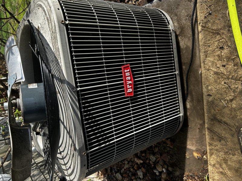 Performed comprehensive maintenance tune-up on 17-year-old Bryant air conditioning system. Replaced air filter, cleared condensate drain line, inspected electrical components, and cleaned condenser coil. Started system and verified operational performance with subcooling reading of 4-5°F and temperature split of 18°F across evaporator coil. Conducted UV dye leak inspection with no leaks detected at this time.