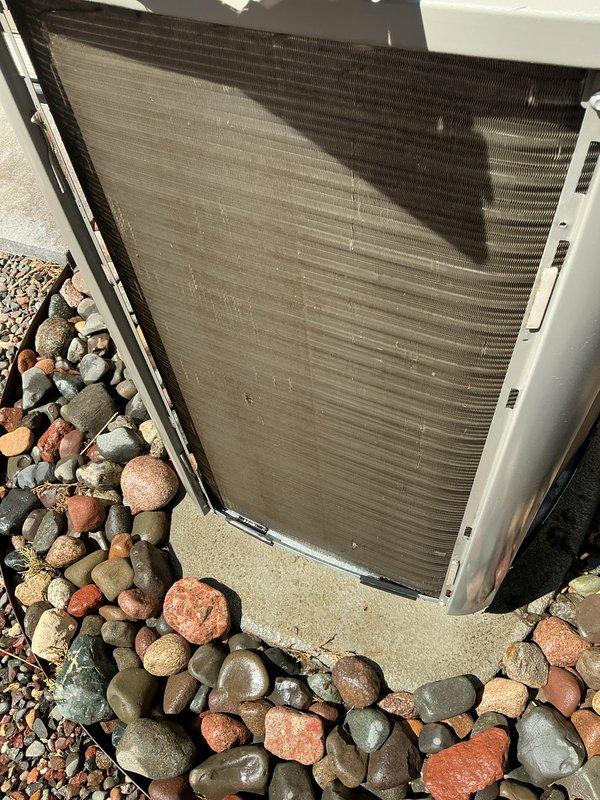 Performed scheduled maintenance tune-up on a 3-year-old Lennox heat pump system. Inspected outdoor condenser unit and found significant dust and debris accumulation on coil fins, restricting airflow and reducing system efficiency. Thoroughly cleaned condenser coil to restore proper heat exchange function and replaced indoor air filter to ensure optimal system performance.