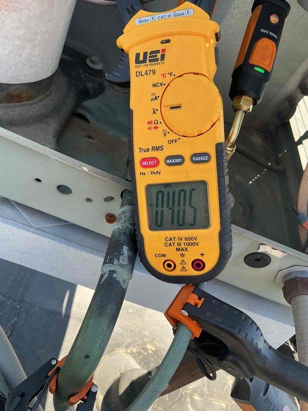 Performed comprehensive maintenance inspection on 21-year-old Ruud R22 air conditioning system. Verified contactor, capacitor, and refrigerant charge all within normal operating parameters. Condenser coil found clean with adequate airflow. Compressor operational but showing signs of wear with elevated amp draw indicating reduced efficiency. Air filter in acceptable condition. Furnace access panels could not be removed due to difficult accessibility, though system is currently functioning properly. Given the age of the R22 system and compressor wear indicators, recommended proactive equipment replacement consultation to prevent potential system failure and unplanned downtime. Coordinated follow-up appointment with service advisor for new equipment evaluation and proposal.
