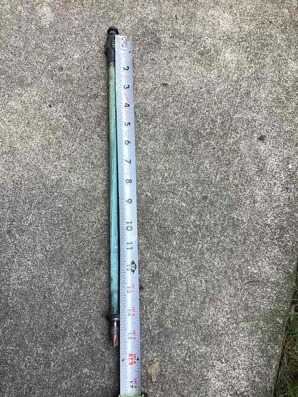 Responded to exterior water spigot leak on north side of residence. Upon inspection, identified faulty stem assembly causing visible leak at hose bib fixture mounted to wood-sided exterior wall. Customer confirmed leak location and noted water shutoff was not required. Diagnosed worn stem component requiring replacement. Ordered necessary replacement parts for stem assembly to complete repair and restore proper function to outdoor faucet. Documented existing conditions with photographs showing spigot installation, connection points, and measurement reference.