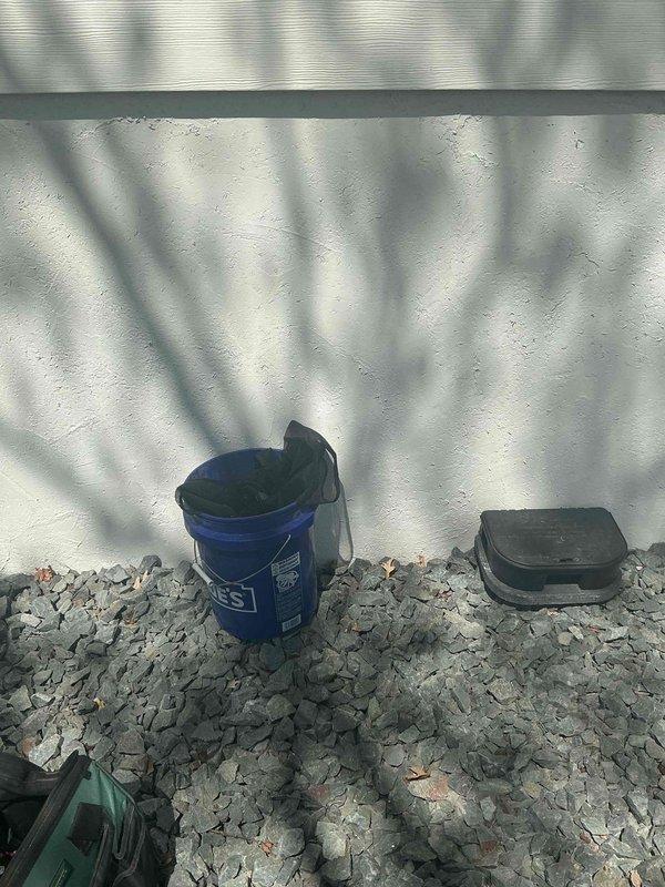 Completed maintenance inspection on two residential air conditioning units with heavily soiled exterior components. The homeowner had previously disassembled the Goodman condenser unit due to significant coil buildup. Thoroughly cleaned both condenser coils to restore proper airflow and heat transfer efficiency.