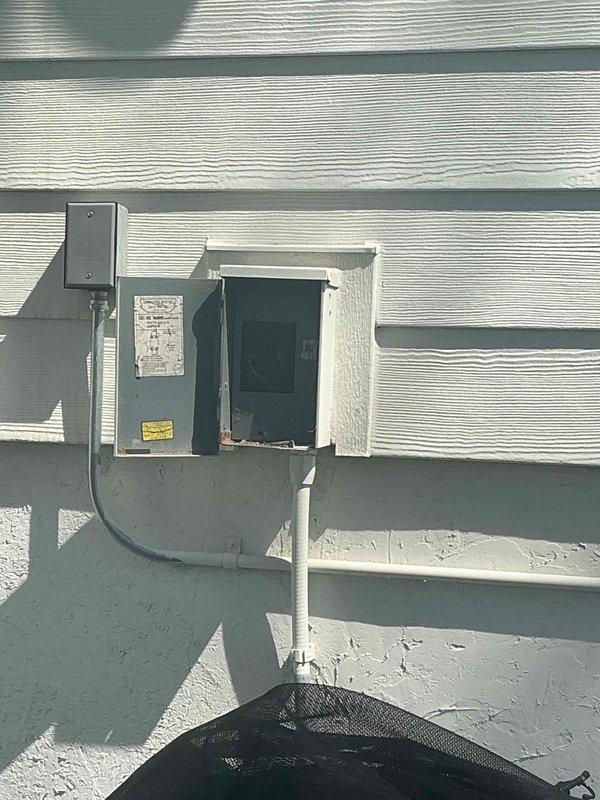 Completed maintenance inspection on two residential air conditioning units with heavily soiled exterior components. The homeowner had previously disassembled the Goodman condenser unit due to significant coil buildup. Thoroughly cleaned both condenser coils to restore proper airflow and heat transfer efficiency.