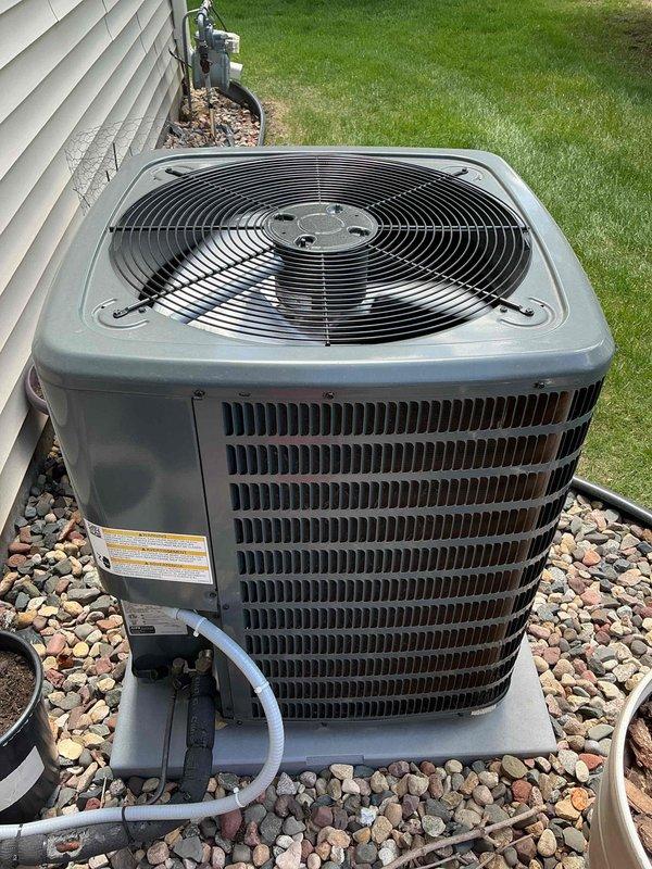 Performed comprehensive air conditioning tune-up on 3-year-old residential cooling system currently under manufacturer warranty. Verified refrigerant charge levels within proper operating range using digital manifold gauges, confirming superheat and subcooling readings within specification. Conducted complete system inspection including all electrical components, contactors, capacitors, and safety controls. Evaluated outdoor condensing unit operation, verified proper fan motor function, and inspected condenser coil condition. All components tested and found operating properly within manufacturer specifications. System confirmed fully operational with no deficiencies noted.