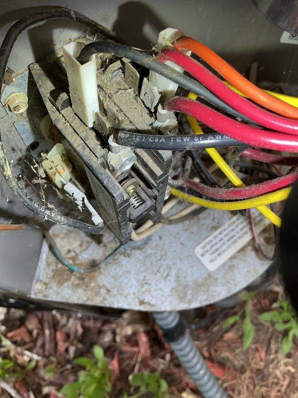 Completed annual AC maintenance tune-up on 19-year-old system utilizing R22 refrigerant. Inspected all electrical connections, tested amperage draw, and evaluated system components. Noted contactor showing moderate pitting and recommended replacement option, though dual capacitor appears to have been recently replaced and is in acceptable condition.
