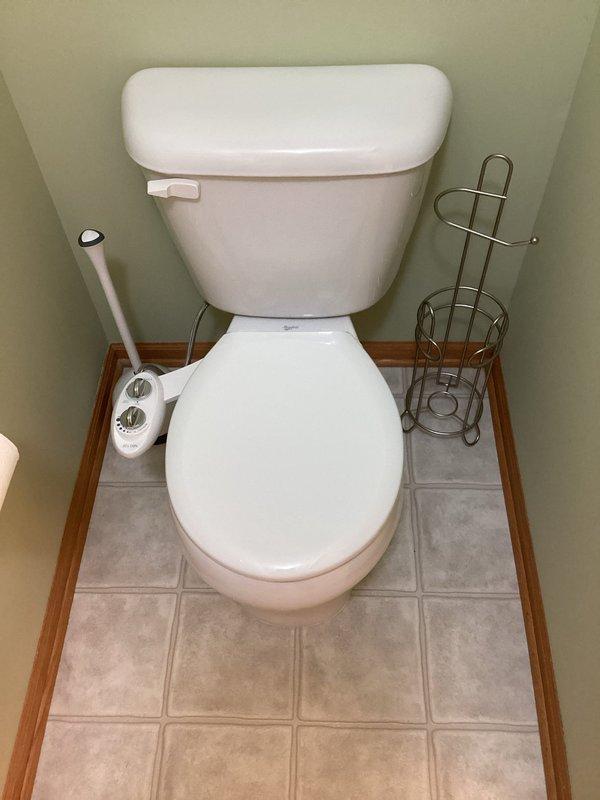 Conducted on-site assessment for replacement of three existing standard-height toilets with taller, elongated comfort-height models. Inspected all three units and associated plumbing connections, noting original toilets equipped with aged shut-off valves requiring replacement. Documented existing fixture configurations, water supply line conditions, and mounting hardware. Prepared comprehensive estimate for complete toilet replacement including removal and disposal of existing fixtures, installation of three new comfort-height elongated toilets, and replacement of three deteriorated angle stops with new quarter-turn shut-off valves. Photographed current plumbing conditions and fixture connections for estimate documentation purposes.