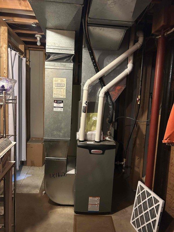 Completed annual cooling maintenance visit on one-year-old Lennox air conditioning system. Performed comprehensive electrical testing with all readings within manufacturer specifications. Removed condenser panels and thoroughly cleaned coil, cleared condensate drain line, and demonstrated proper air filter replacement procedure to homeowner. System operational testing confirmed 22-degree temperature split across evaporator coil, indicating proper refrigerant charge and optimal cooling performance.