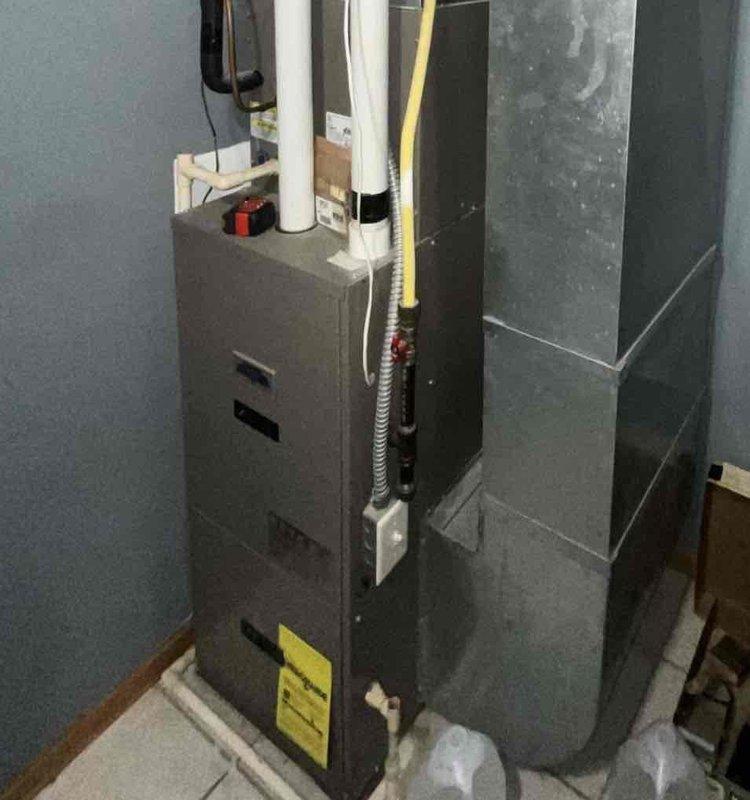 Responded to no heat call on 20-year-old furnace experiencing intermittent failure to ignite. Unit was running through cycle but shutting down without firing, displaying same fault code as previous service call earlier in the year. Upon diagnostic testing, discovered no 24-volt signal present to or through the pressure switch circuit during initial troubleshooting. Performed comprehensive system testing and attempted to replicate the failure condition by cycling unit multiple times and forcing potential trip scenarios. Issue did not recur during extended testing period, suggesting intermittent electrical fault in low-voltage control circuit or pressure switch assembly. Given age of equipment and history of recurring intermittent failures, recommended monitoring system closely and considering replacement due to reliability concerns with 20-year-old components.