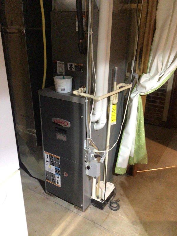 Replaced the burner assembly on a Lennox furnace located in the basement mechanical room. Removed the old burners and installed new replacement burners, then cycled the unit multiple times to verify proper ignition and operation across all burners.