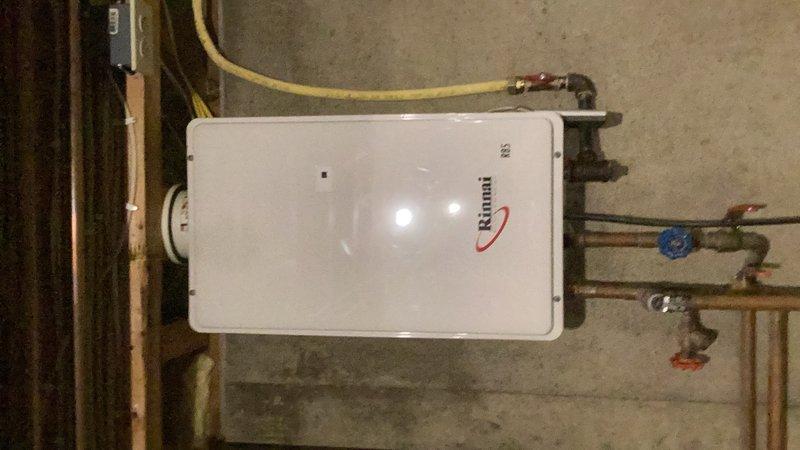 Performed comprehensive maintenance service on a Rinnai tankless water heater unit. Executed complete system flush to remove mineral buildup and sediment accumulation from the heat exchanger, ensuring optimal performance and efficiency. Inspected all water supply connections, gas line connections, and shut-off valves for proper operation. Verified unit functionality upon completion of maintenance procedures.