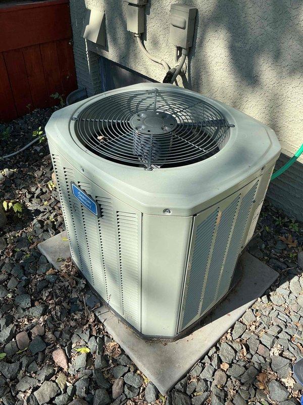 Completed pre-season AC maintenance on an 8-year-old residential air conditioning system. Upon inspection of the outdoor condenser unit, discovered significant debris buildup on the coil and an animal nest within the unit. Removed the nest material and thoroughly cleaned the condenser coil to restore proper airflow and system efficiency. Performed standard tune-up procedures to ensure the system is ready for the upcoming cooling season. System tested and confirmed operational with no current issues reported by homeowner.